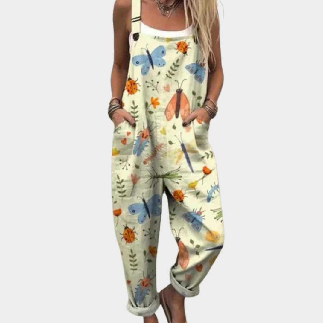 Druckoverall hellgrün mit buntem Tierprint, ärmellos, lockere Passform.
