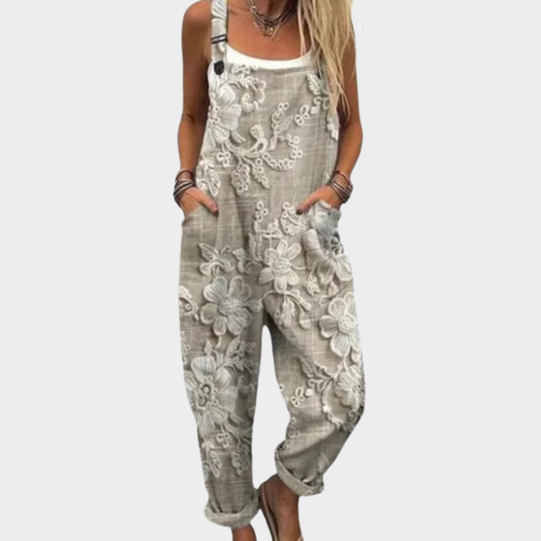 Grauer bedruckter Overall mit Latz, Trägern und weitem Bein mit floralen Mustern