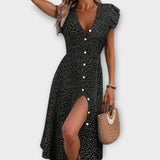 Schwarzes Midi-Kleid mit weißen Polka-Dots, V-Ausschnitt, Knopfleiste und Schlitz vorn