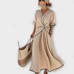 Sommerkleid aus beigem Stoff, V-Ausschnitt, geknotete Taille, kurze Ärmel, Weitschnitt