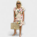 Florales Eleganzkleid mit Blumenprint, kurze Ärmel, Volantrock, cremefarben