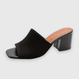 Schwarze Mule-Sandale mit Blockabsatz und Strickschaft, offene Zehen