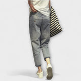 Jeanshose mit 7/8-Saum und strukturierter Used-Optik, seitliche Eingrifftaschen
