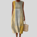 Ärmelloses gestreiftes Sommerkleid mit lockerem Schnitt, gelb-blau-creme Streifen