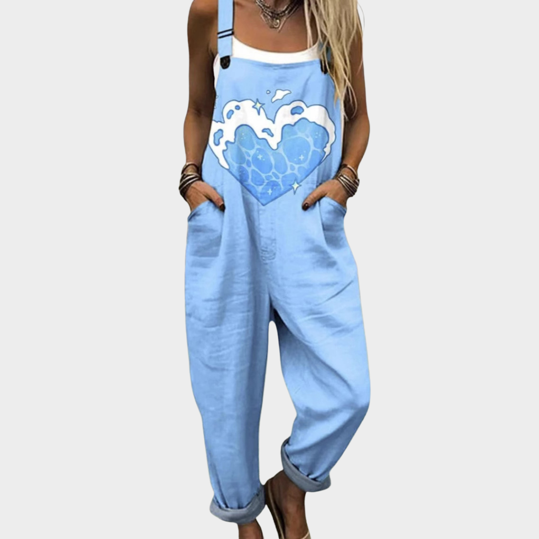 Blauer Print-Overall mit Trägern und Frontmotiv, weitem Bein und Eingrifftaschen