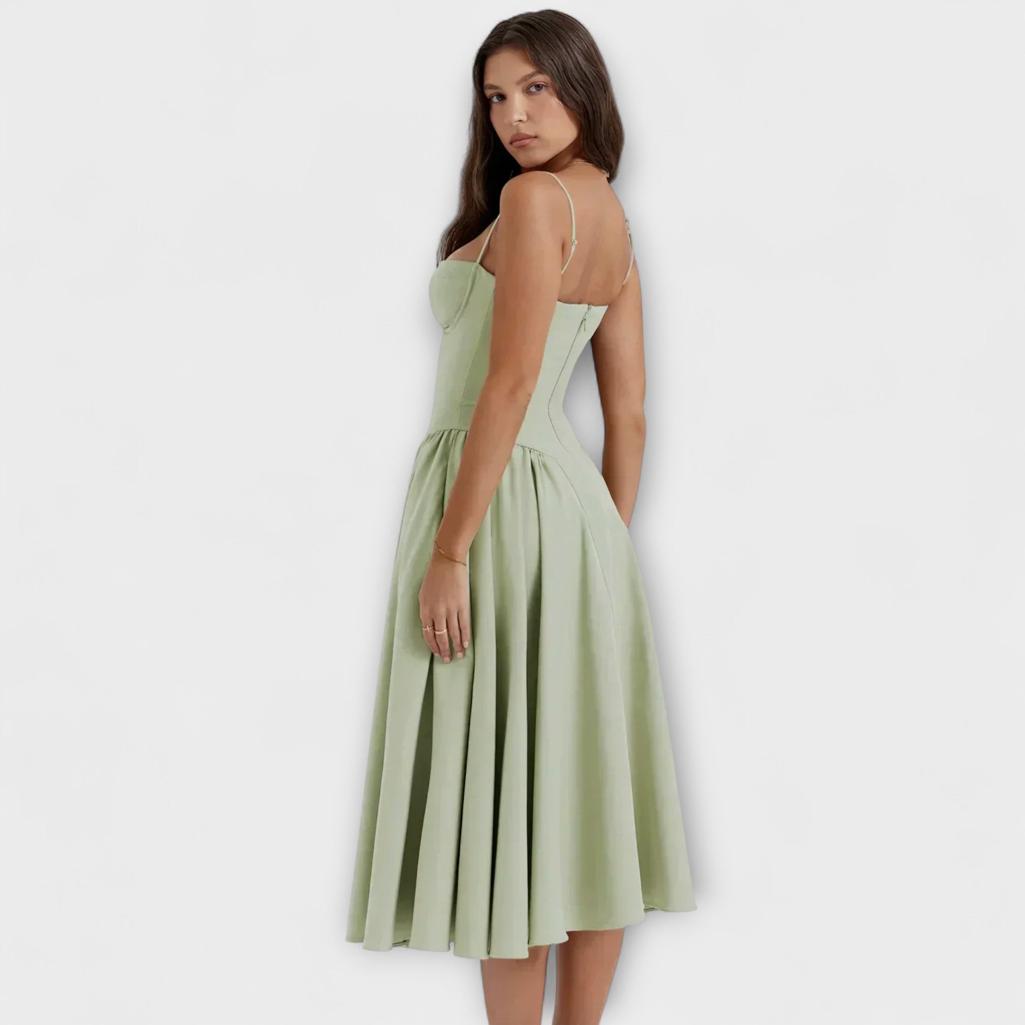 Hellgrünes ärmelloses Korsettkleid, seitliche Ansicht, mit Trägern und Glockenrock