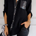 Schwarzes Damen-V-Ausschnitt-Shirt mit Knopfleiste und Pailletten-Brusttasche