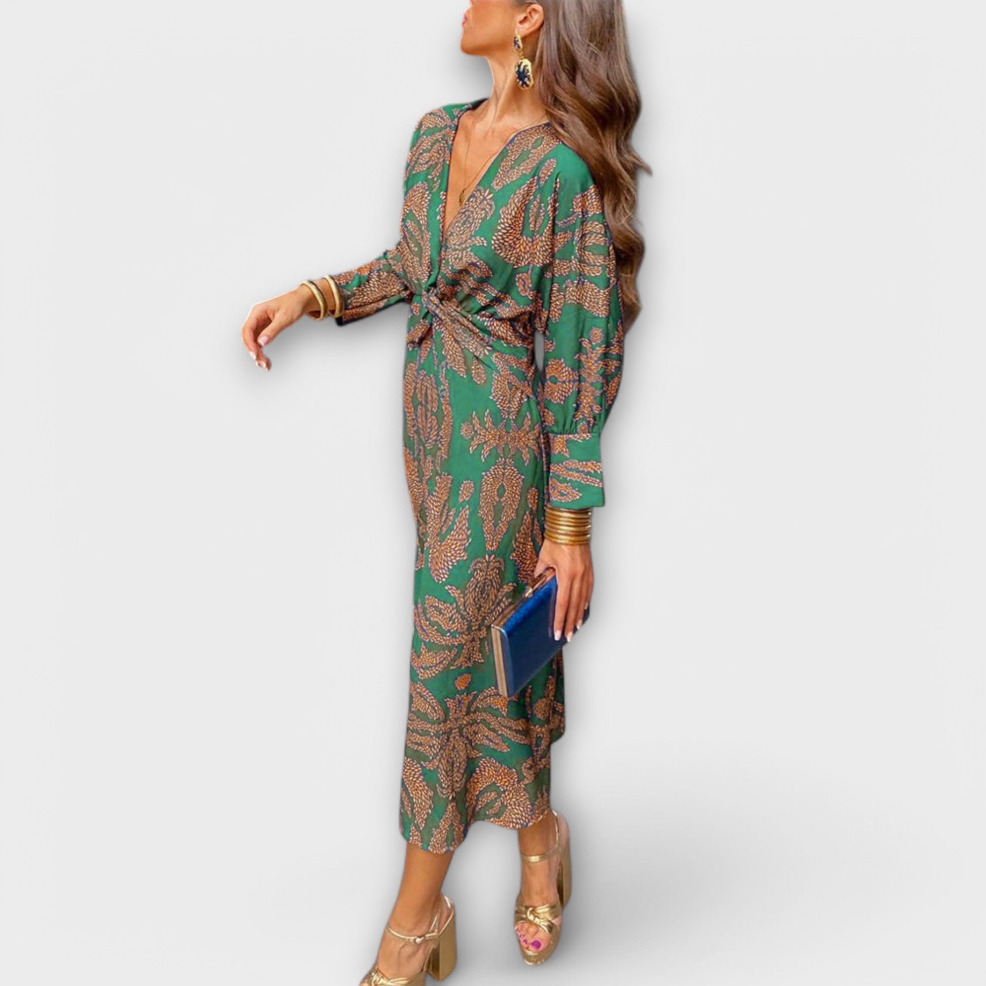 Elegantes Kleid mit langen Ärmeln, grün mit goldfarbenem Muster, seitliche Ansicht