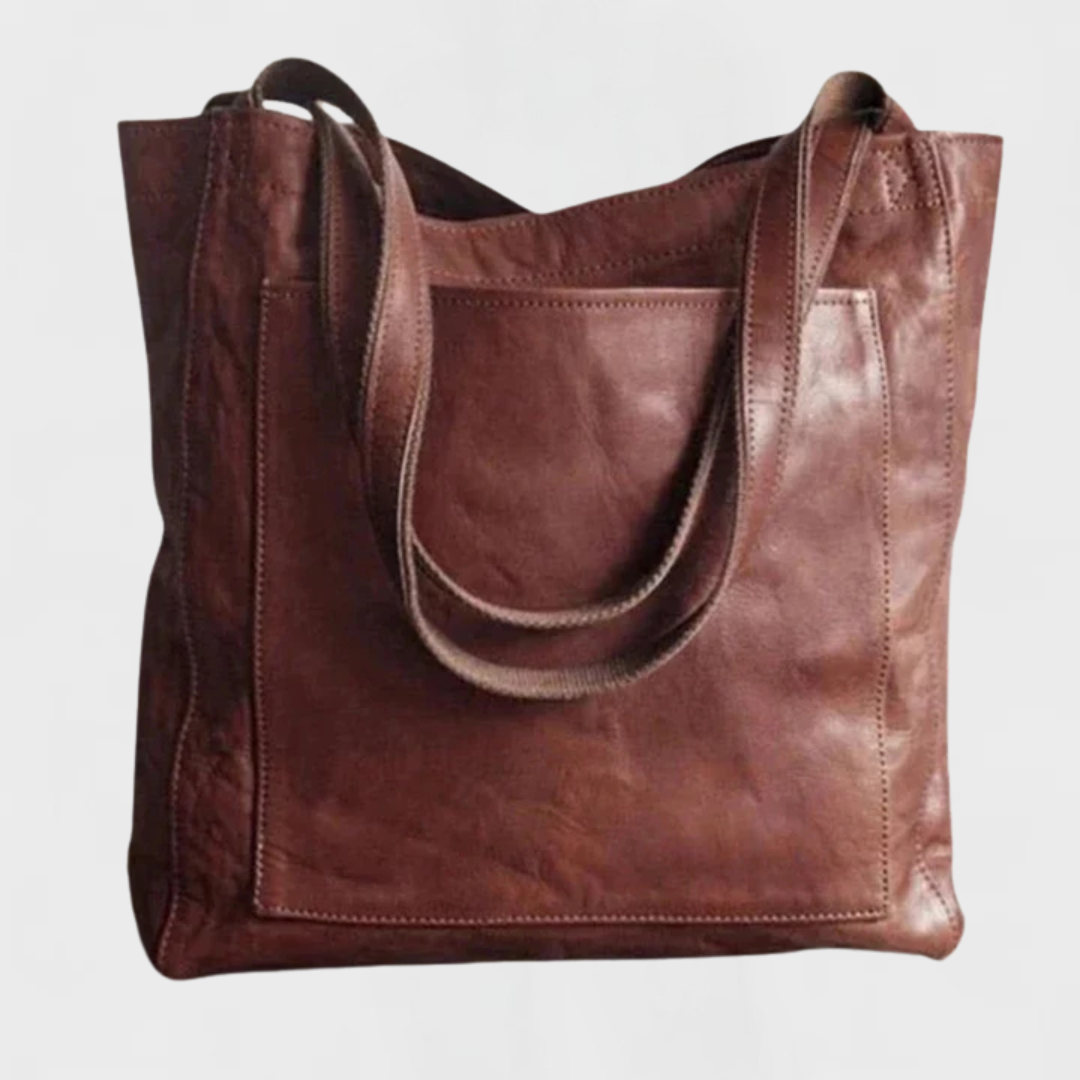 Elegante Lederhandtasche, dunkelbraun, breite Schulterriemen, Innenfach oben offen.