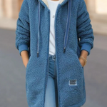 Warme Teddyweste mit Kapuze, blau, Reißverschluss und seitliche Taschen.