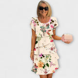 Florales Eleganzkleid mit Blumenprint, kurzer Ärmel, Volants am Saum, beige-weiß