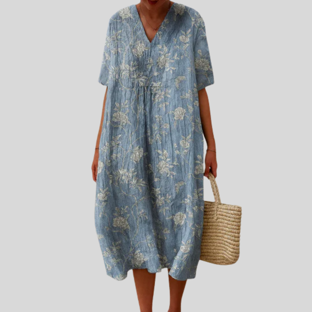 Leichtes Sommerkleid aus blauem Stoff mit floraler Print, V-Ausschnitt, kurzen Ärmeln und geraffter Taille