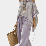 Lila Bardot-Top mit gerafftem Ausschnitt und passender weiter Hose im Boho-Look