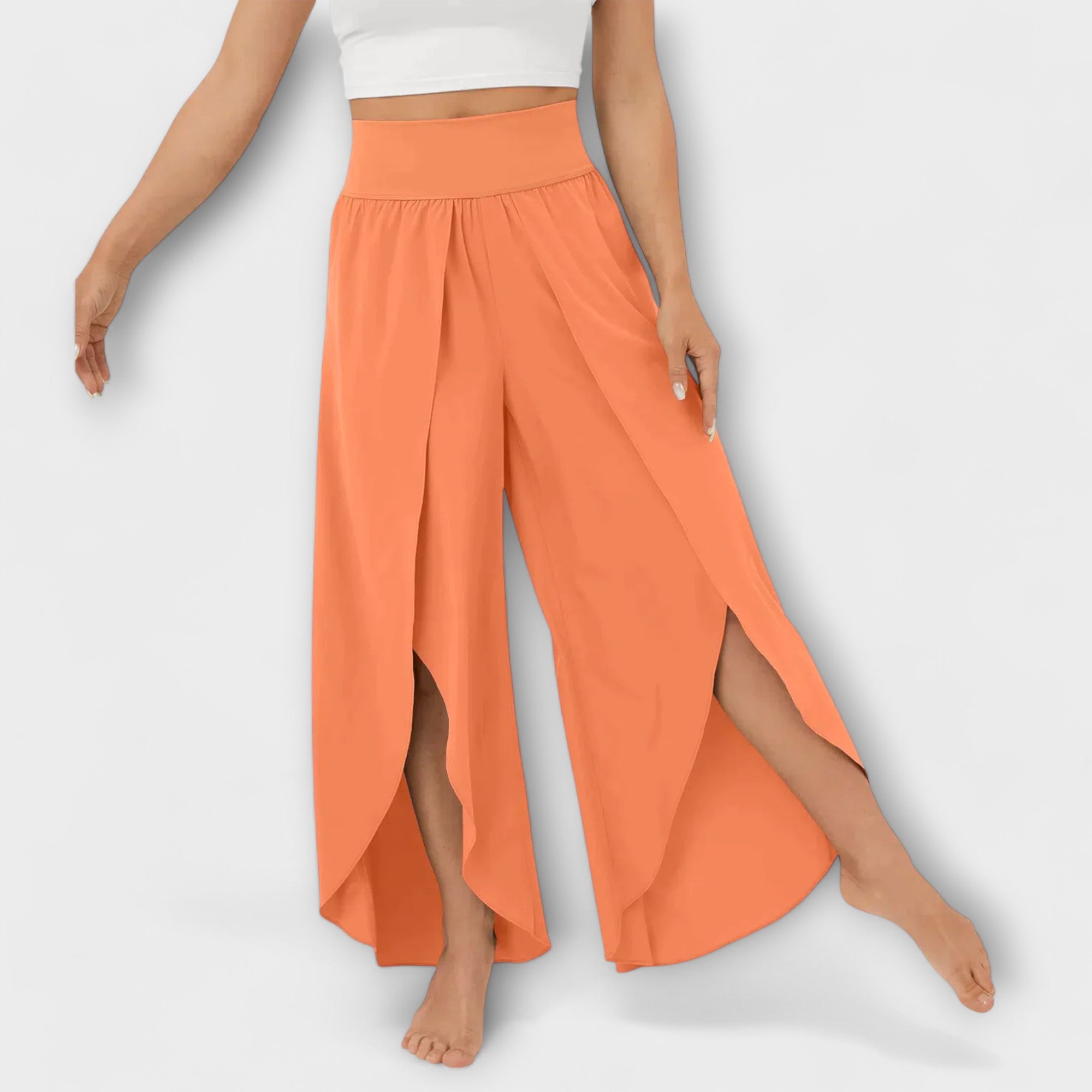 Damenhose in Orange mit breitem elastischem Bund und seitlichem Schlitz, schwingender Saum
