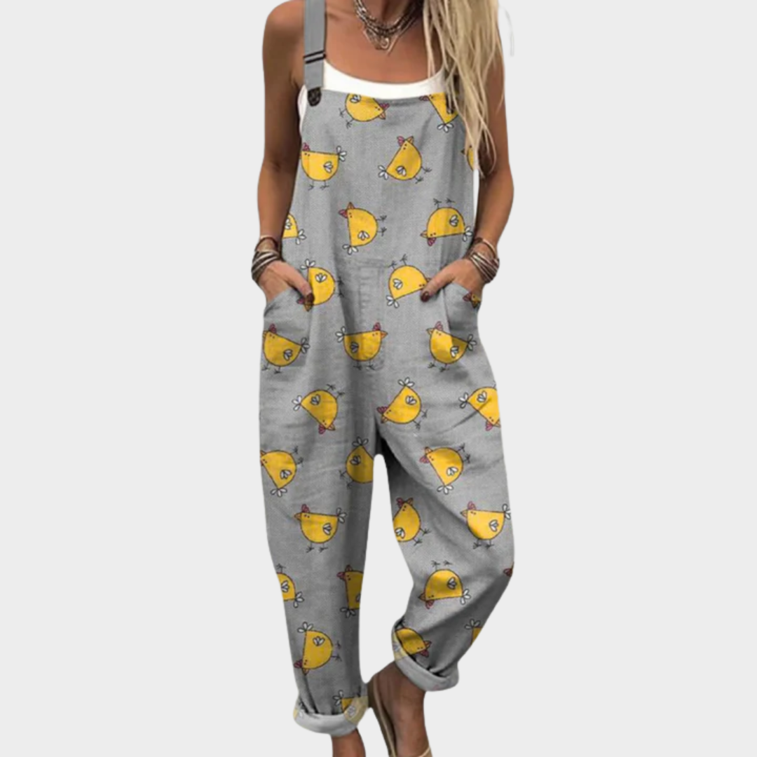 Bequemer Druckoverall in Grau mit gelben Katzengesichtern