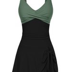 Badekleid mit Wickel-Optik oben, schwarz mit olivgrünen Trägern und Rocksaum