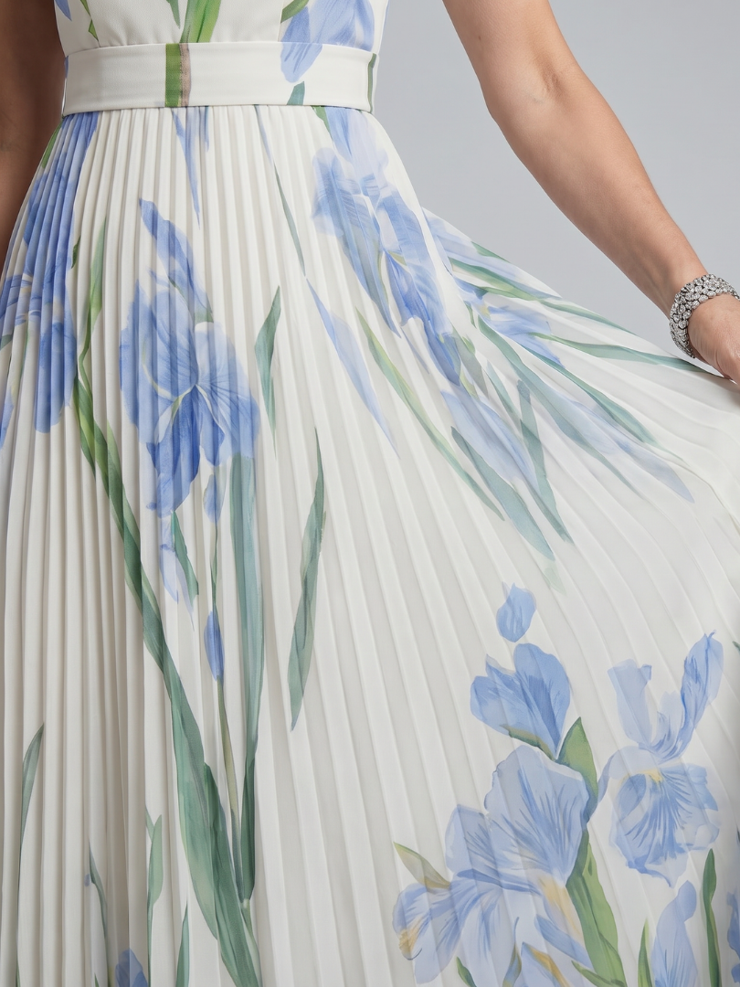 Midikleid mit Faltenrock, weißes Blumenmuster in Blau und Grün, hoher Taillenbund