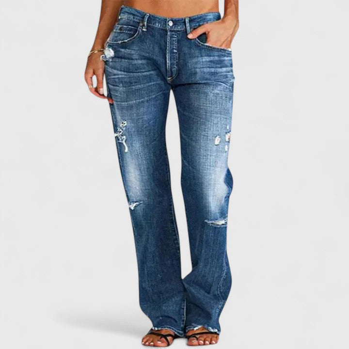 Dunkelblaue Jeans mit großen Destroyed-Details und geradem Bein