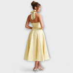 Romantisches Midikleid in Gelb mit Neckholder-Rückenband und weiter Glockenform