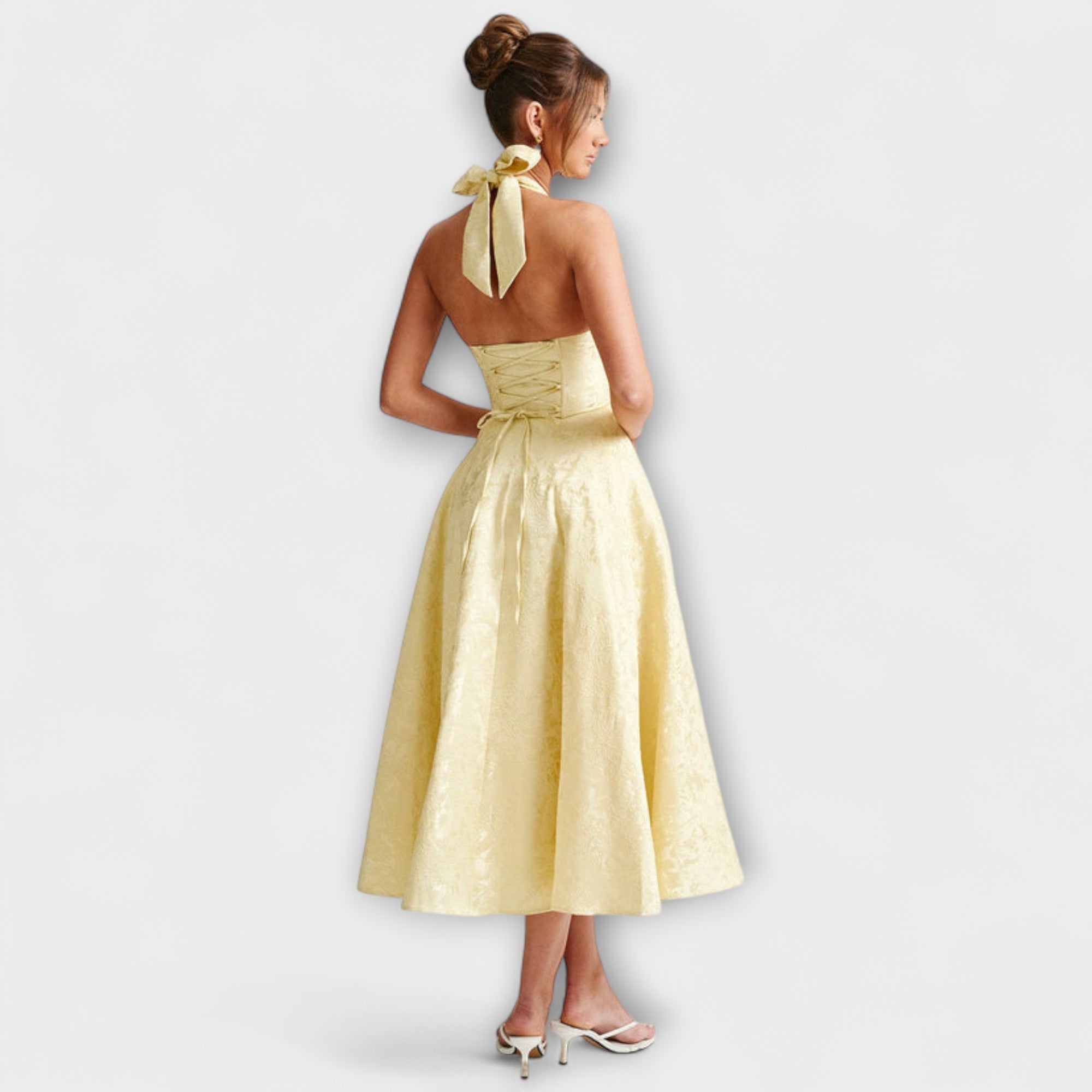 Romantisches Midikleid in Gelb mit Neckholder-Rückenband und weiter Glockenform