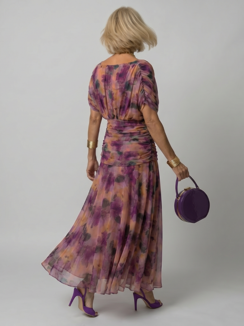 Lila Off-Shoulder-Midi-Kleid von Calen, Rückansicht mit Blumenmuster und Midi-Saum