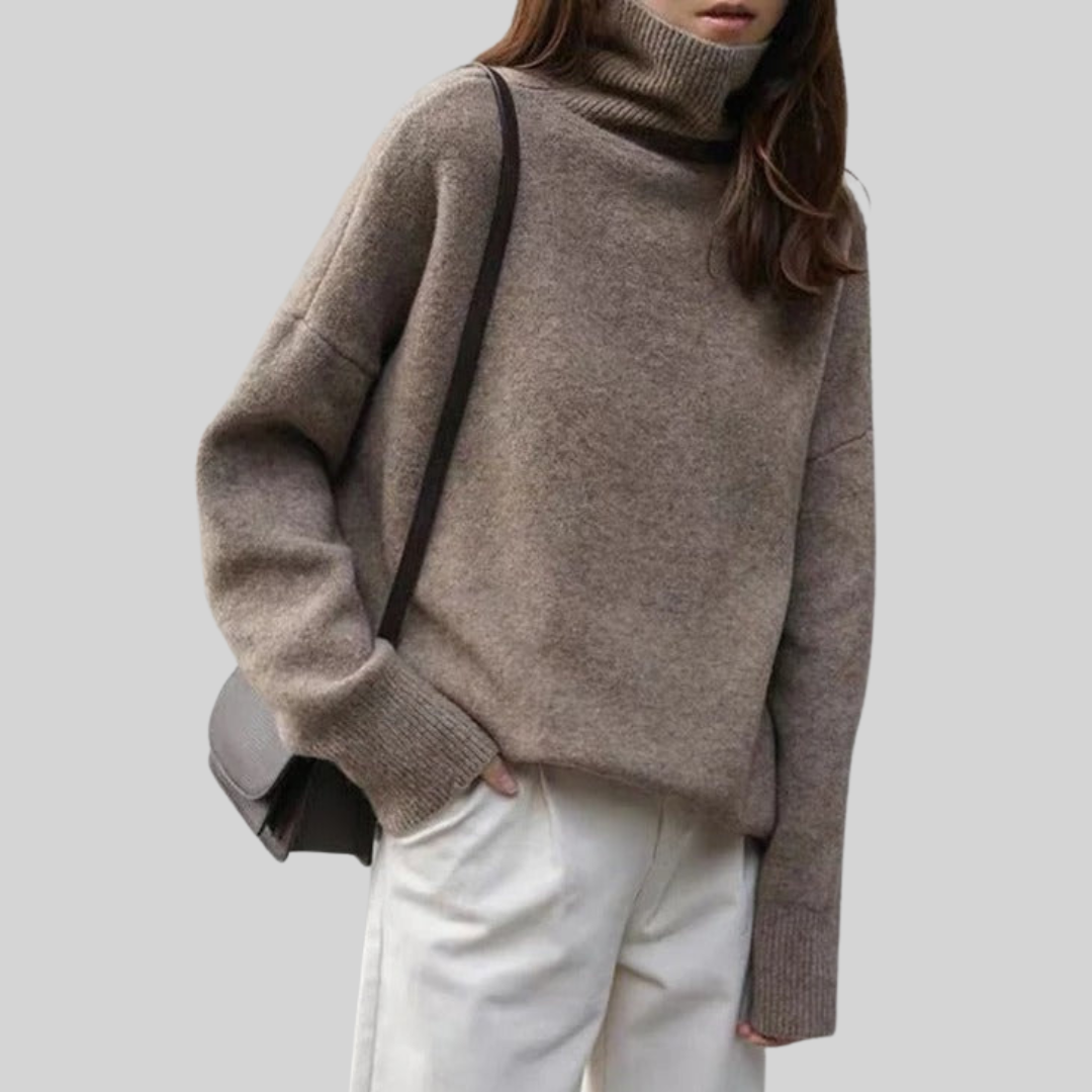 Beiger Rollkragenpullover aus Strick mit langen Ärmeln und breiten Bündchen