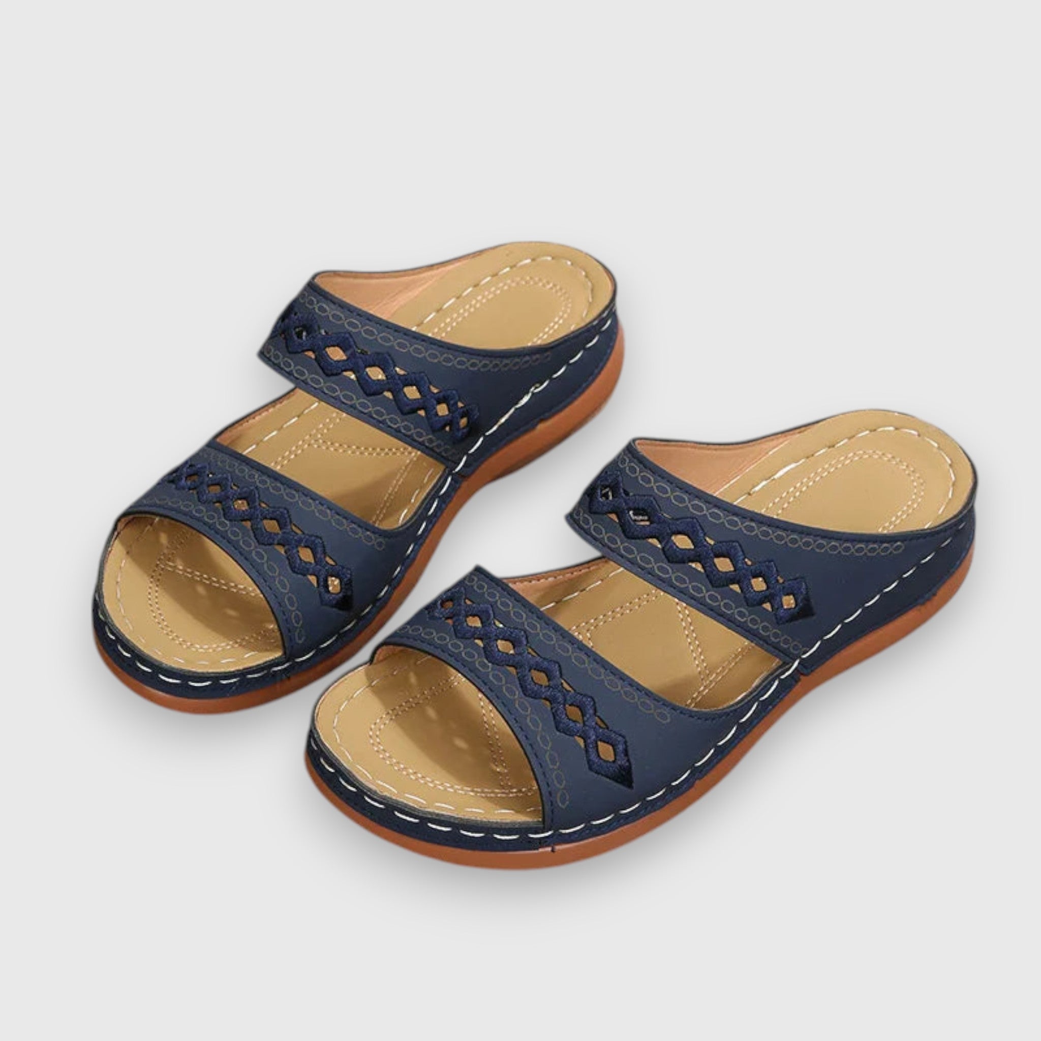 Orthopädische Sandalen in Dunkelblau mit Riemchen und Zierlochmuster, offene Zehen