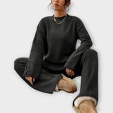 Schwarzes Rippenset aus Pullover und Hose mit gerippten Bündchen