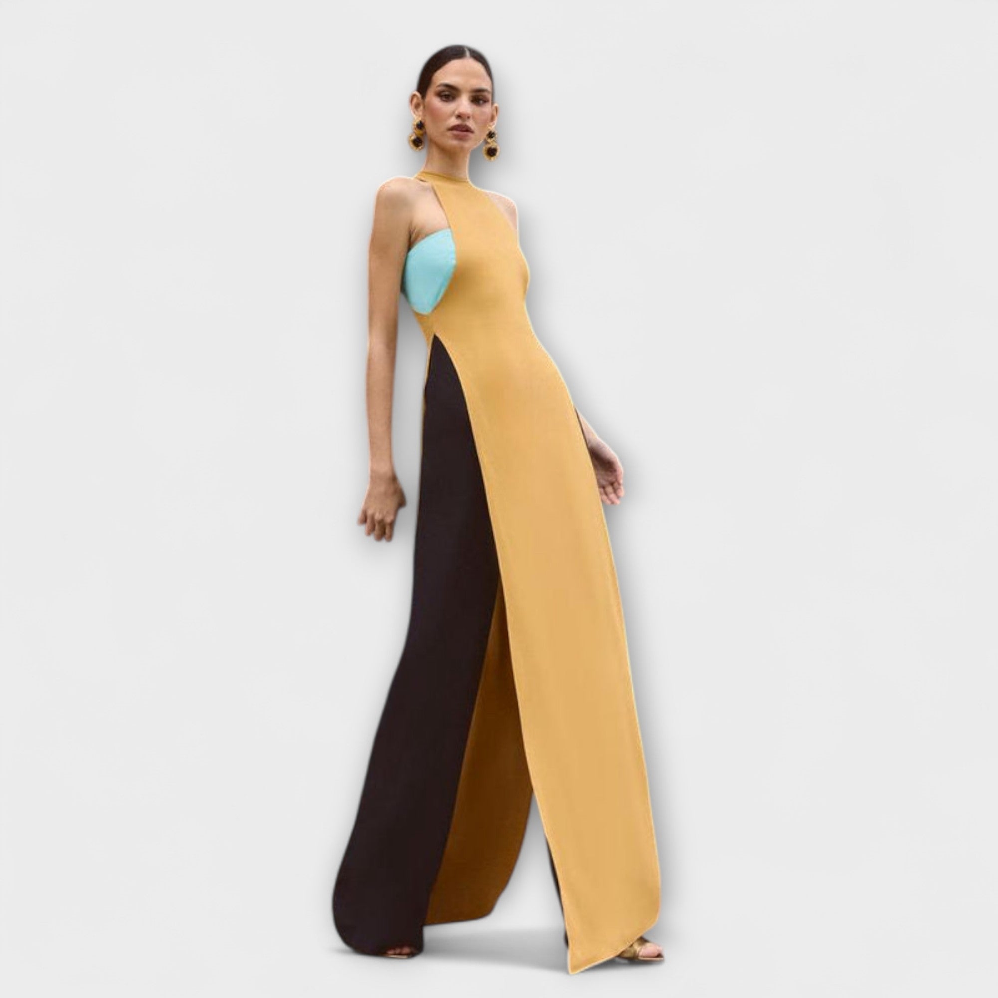 Ärmelloser Jumpsuit, gelbe Partien mit schwarzer Seite, türkisfarbene Öffnung am Oberteil