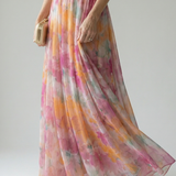 Maxi-Wickelkleid, schwingender Rock mit bunter Farbverlauf-Optik und transparenten Lagen