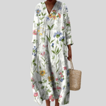 Flatterndes Sommerkleid mit Blumenprint, V-Ausschnitt und langen, weiten Ärmeln