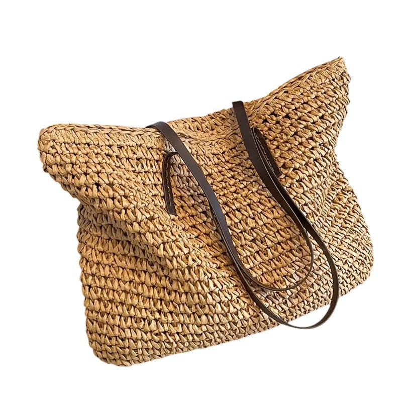 Geflochtene Tote Bag in Honigbraun mit schwarzen Lederhenkeln