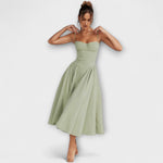 Hellgrünes ärmelloses Korsettkleid mit Trägern und plissiertem Rock