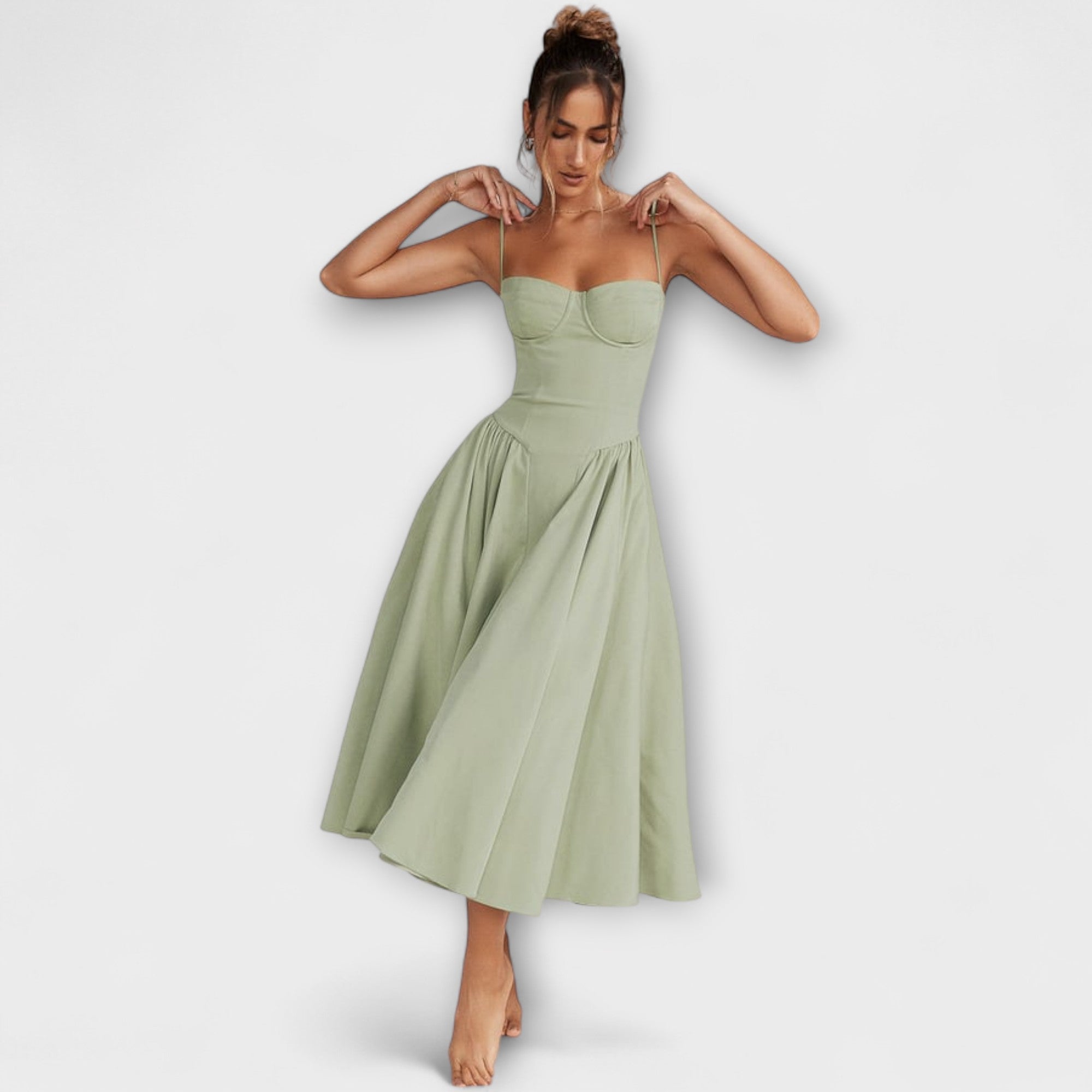 Hellgrünes ärmelloses Korsettkleid mit Trägern und plissiertem Rock