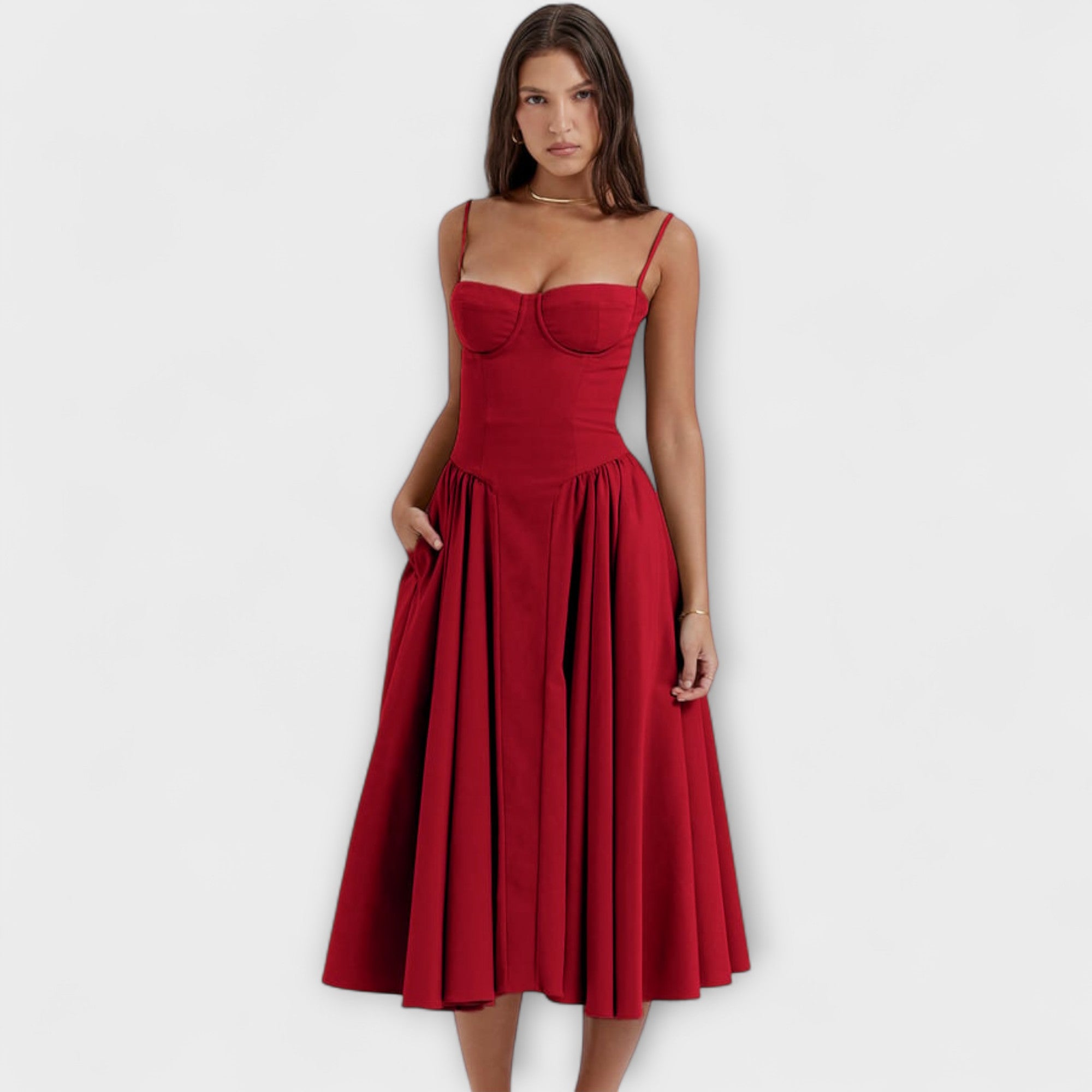 Rotes ärmelloses Korsettkleid mit Spaghettiträgern und plissiertem Rock
