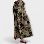 Braunes Kleid mit schwarzem Blumenmuster, weitem Schnitt und langen Ärmeln