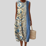 Ärmelloses Midikleid mit blauem floralen Muster und Knopfleiste