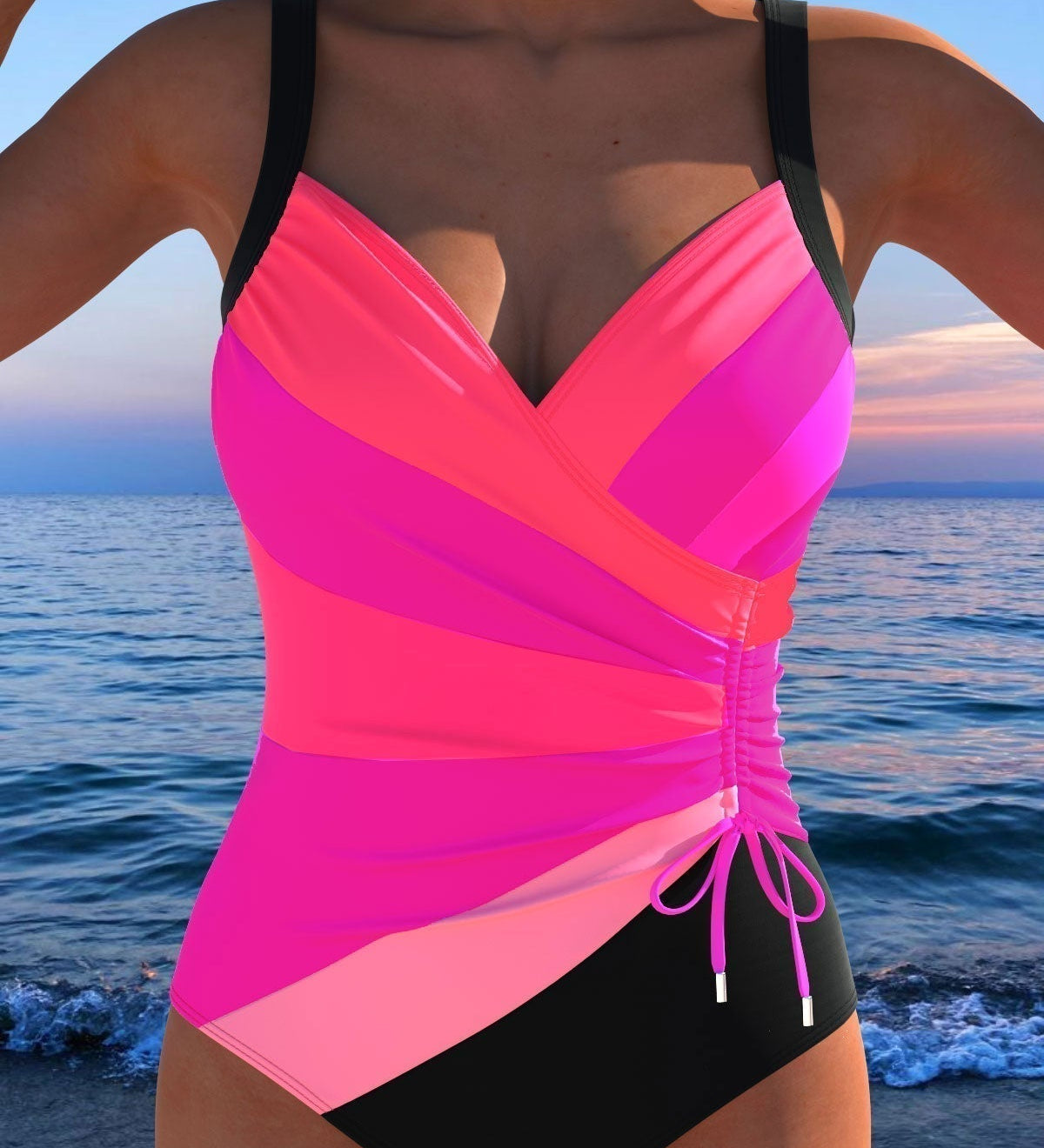 Badeanzug mit Wickeloptik in Pink mit grafischem Print und seitlicher Kordel