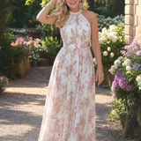Fließendes Midikleid mit Blumenmuster, ärmellos, Halterneck; hell mit rosafarbenen Blüten, schwingend