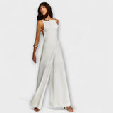 Weißer Halter-Jumpsuit mit weitem Bein und seitlichem Nahtverlauf