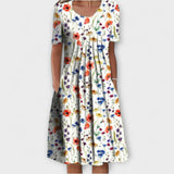 Schichtkleid mit buntem Blumenmuster, kurze Ärmel, ausgestellter Rock