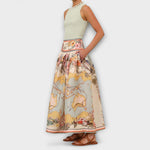 Midi-Rock mit Faltenwurf und ausgestelltem Schnitt, gelb-beige mit farbigem Paisley-Print.