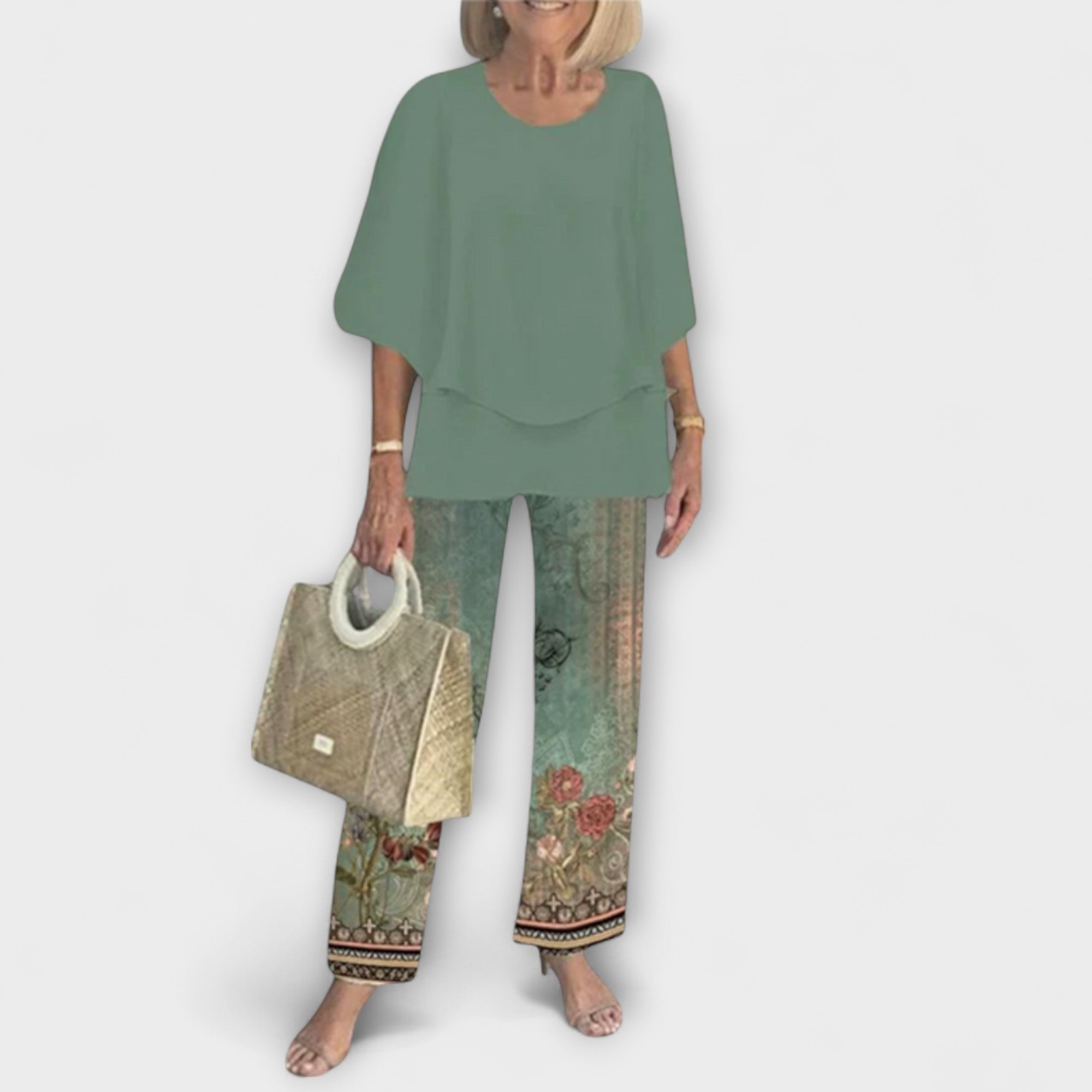 Set aus grüner Bluse und Hose mit grünem Blumen- und Ornamentdruck