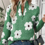 Pullover mit Reißverschlusskragen, grüner Strick mit weißen Blumen und braunem Akzent