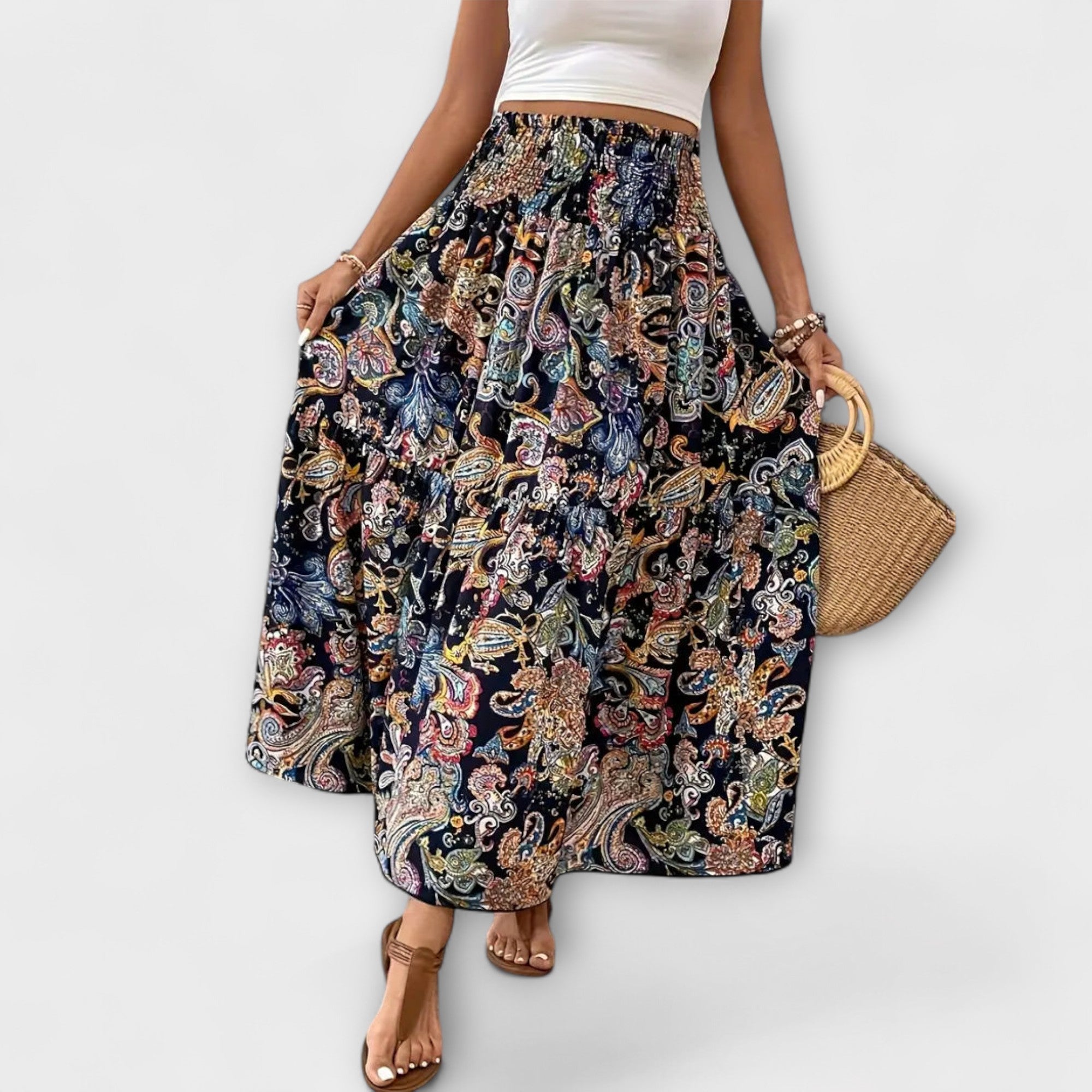 Fliessender Rock mit Muster, weitem Midirock mit buntem Paisley-Print auf dunklem Grund