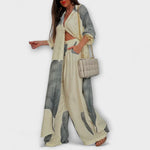 Zweiteiliges Set aus beigem Maxikleid und beigem Kimono mit Streifen