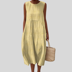 Gelbes ärmelloses Sommerkleid mit Rundhalsausschnitt und gerafftem Rock