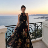 Schwarzes Halter-Neck Midi-Kleid mit floralen Prints, ausgestelltem Rock