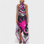 Set aus Neckholder-Top und asymmetrischem Midi-Rock, gemustert in Schwarz und Pink