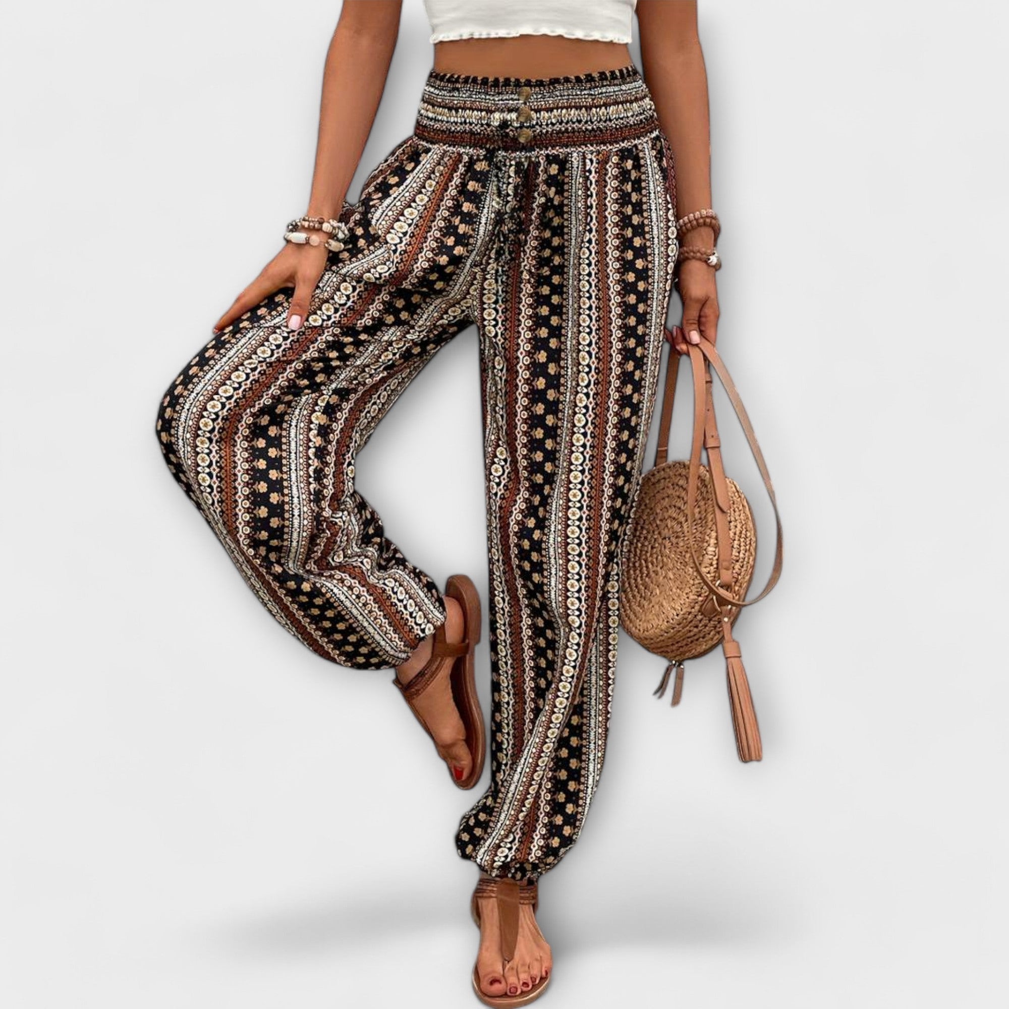 Hose mit ethnischem Allover-Streifenmuster in Schwarz und Beige, elastischer Bund